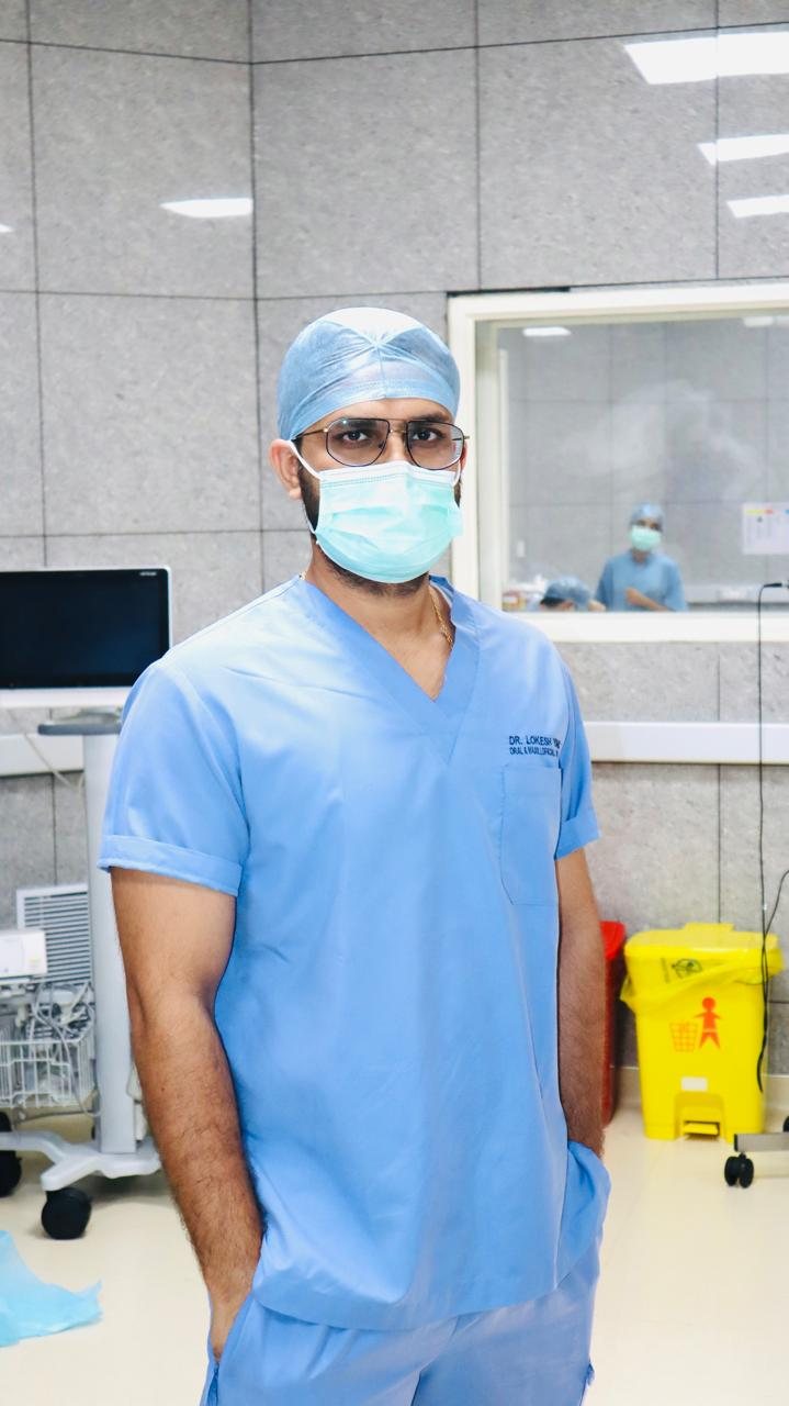 Dr Lokesh Yadav in theatre scrubs